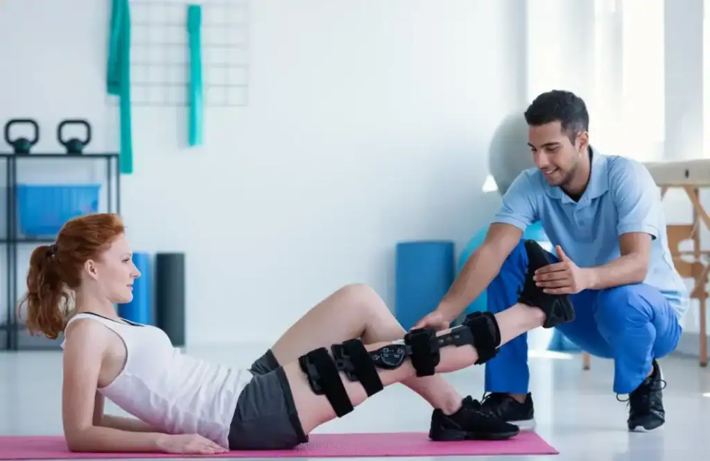 Debunking Meal Timing Myths: The Truth About Muscle Recovery 1 Woman having treatment to help muscle recovery Hillingdon after an injury